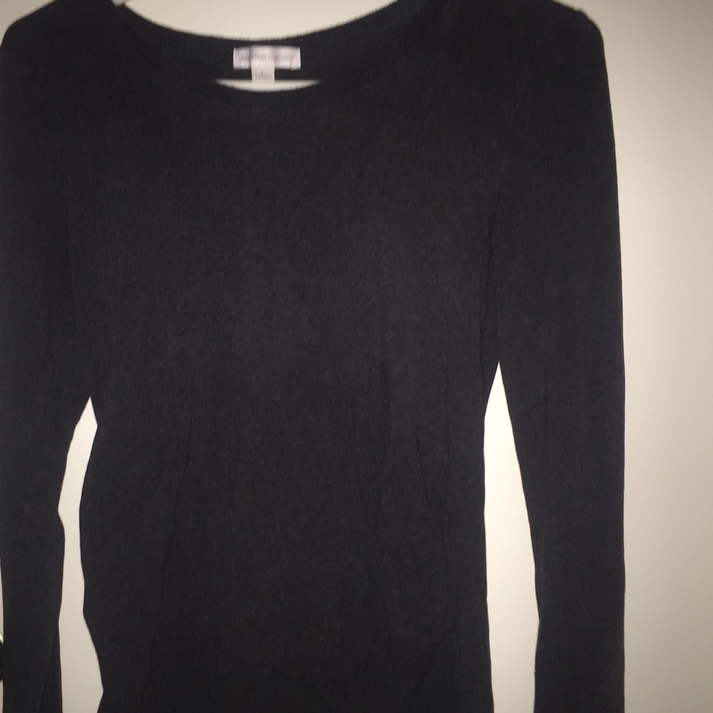 A dark grey long  sleeve with a sinch  on the side